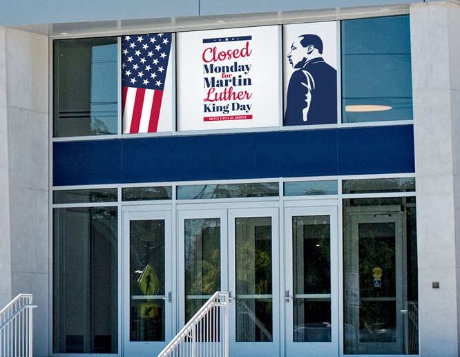 Large closed sign for Martin Luther King Day applied on the institution facade window