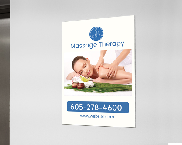 Massage therapy PVC sign with a relaxing woman image.