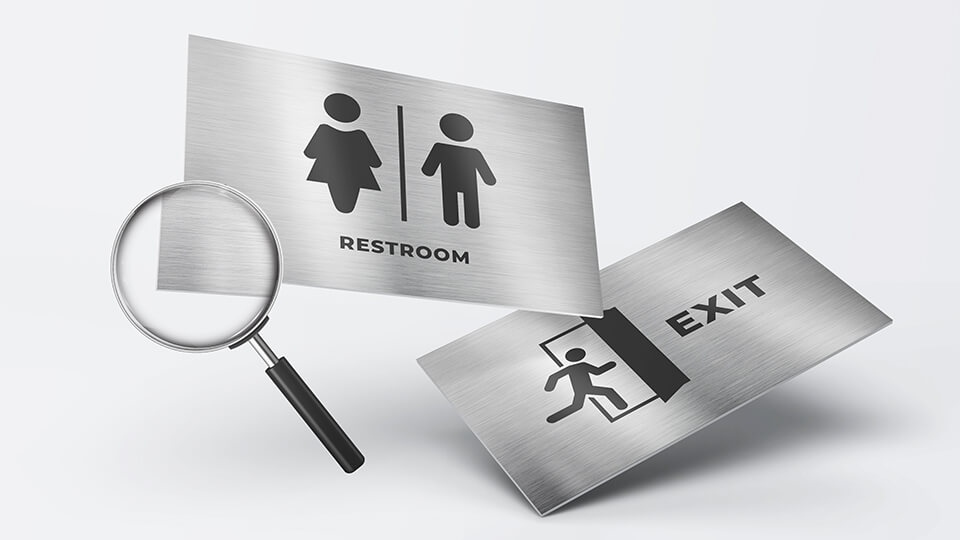 Brushed aluminum signs with informative and caution graphics