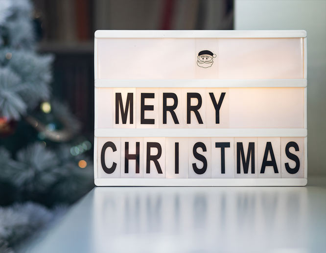 Merry Christmas simple free-standing sign with a tiny Santa Clause image.