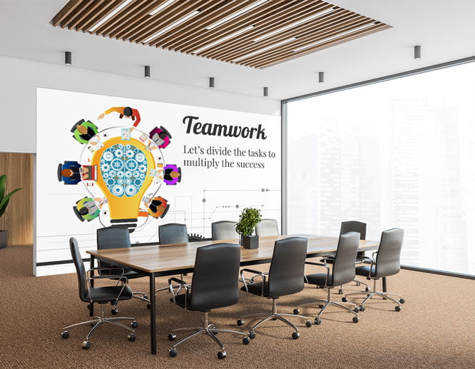 Motivational peel and stick wall decal with a colorful illustration set up in the office