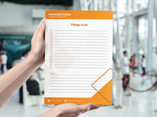 Notepad printing in orange featuring a "Things to Do" checklist with "InnovateFusion" branding