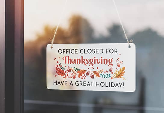 office closed for Thanksgiving sign in white with colorful holiday icons