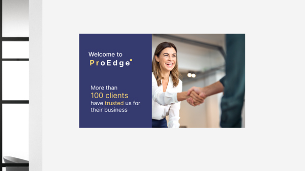 Office wall decal showing handshake with businesswoman and text about 100+ trusted clients.