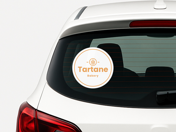 Car rear window with opaque custom car window decal for Tartane Bakery.