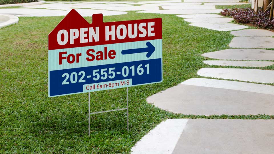 Custom-designed open house sign on the lawn