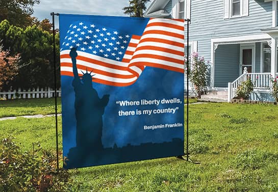 4th of July booth idea in blue displaying Benjamin Franklin quote