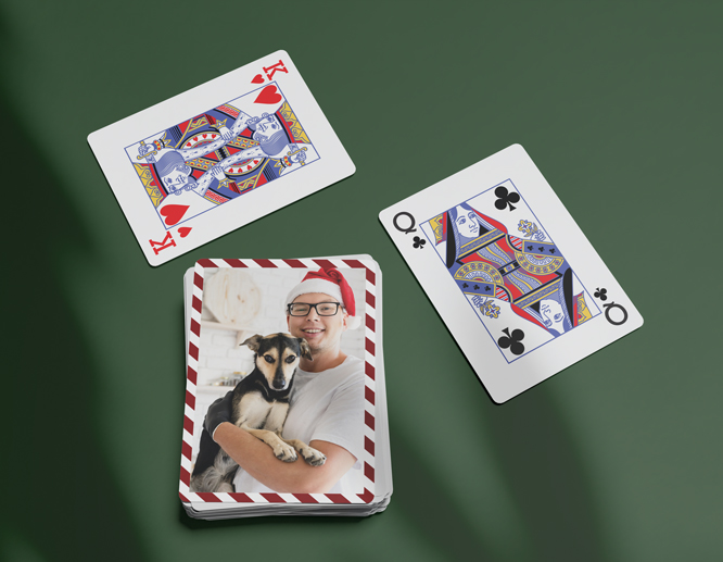 Custom holiday playing cards with personalized photo card and festive illustrated designs.