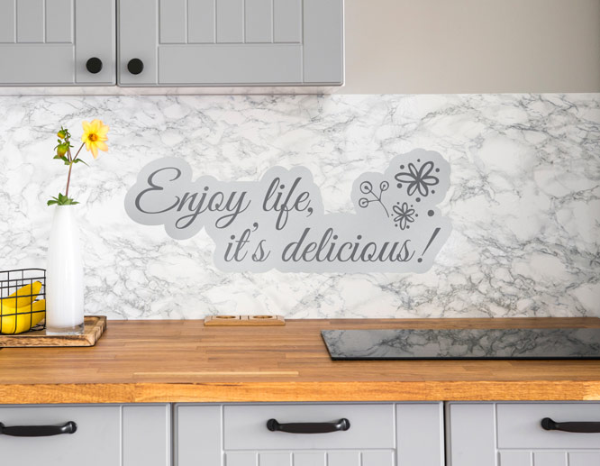 Inspirational quote kitchen wall decal displayed on the tiles” style=