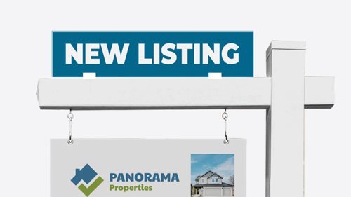 Notable real estate sign promoting a new listing for a property on a blue background