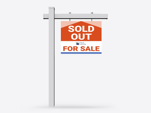 Informative real estate sign notifying passersby that the property has been sold
