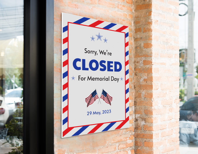 Large Memorial Day closed sign with the US flag mounted on a wall