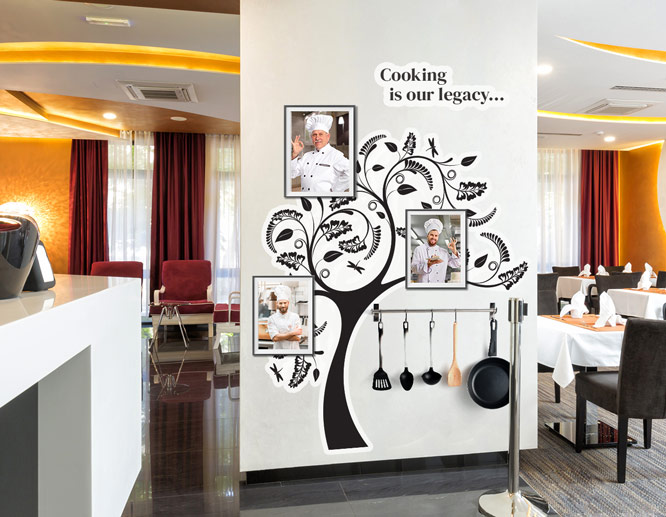 Family tree wall decal in black attached to the wall of the restaurant foyer