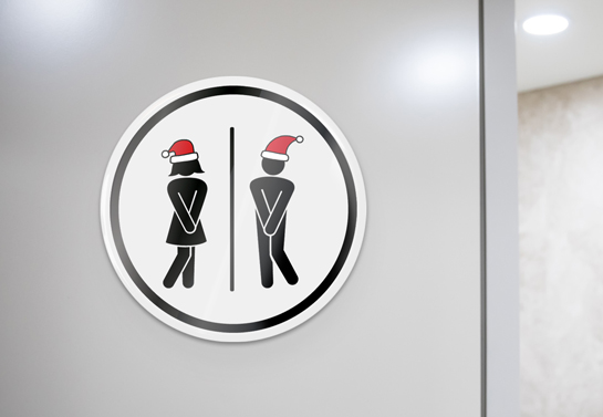 Round-shaped Christmas bathroom sign with funny graphics