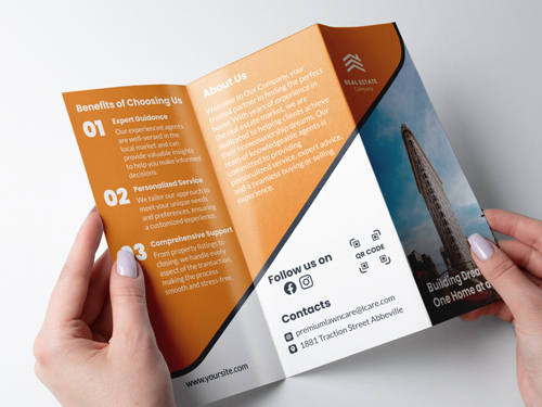 Z-fold brochure printing for a real estate company featuring a service list and contact details