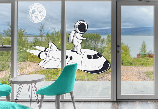 Spaceship shaped white window decal