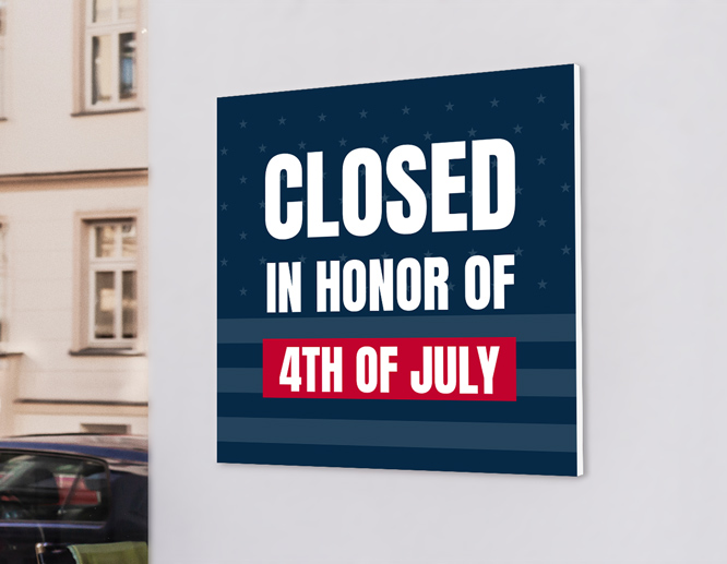 Blue fourth of July closed sign with white texts mounted on the exterior wall