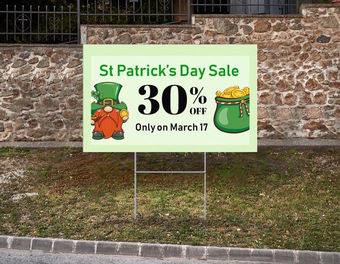 Promotional happy St Patrick's Day sign showcasing a leprechaun and 30% discount in the yard