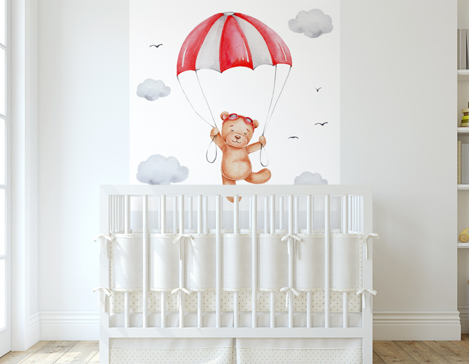 "Teddy Bear with a Parachute" nursery decal displayed on a white wall