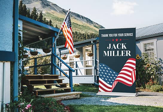 outdoor Veterans Day banner with a thank you display