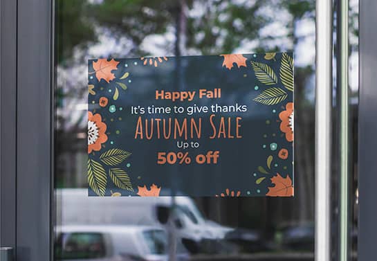 store sale sign with Thanksgiving-themed patters