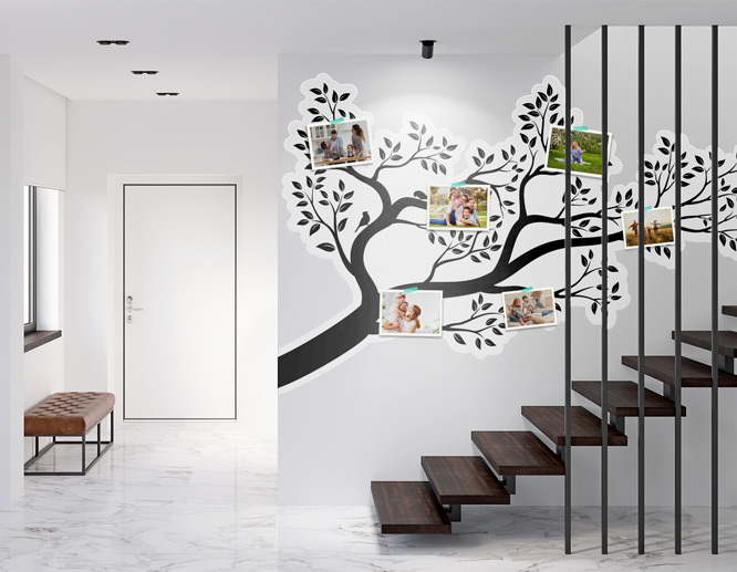 Family tree wall decal in the shape of a tree branch attached to the staircase wall