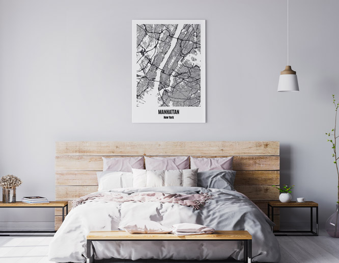black and white modern wall art decor with the map of Manhattan installed on a bedroom wall