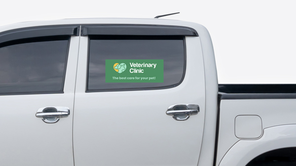 Green truck window decal reading Veterinary Clinic.