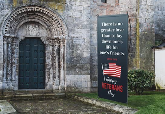 Veterans Day church sign in a dark color displayed outdoors