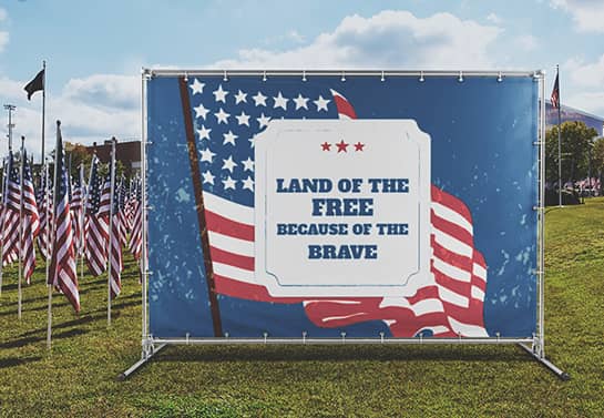 large outdoor Veterans Day backdrop displaying a patriotic quote