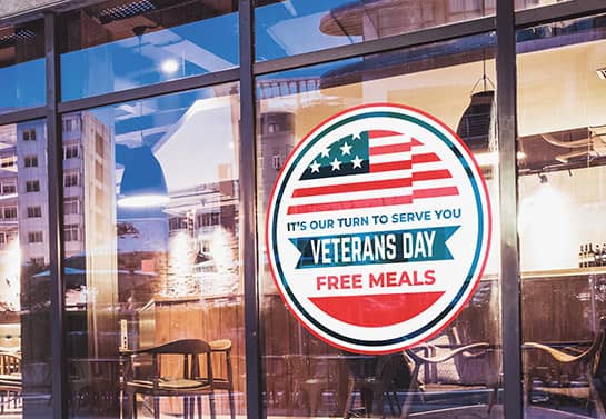 Veterans Day free meals sign in a round shape