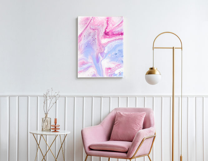 Aesthetic wall art design in a bedroom with blended pink and blue coloring