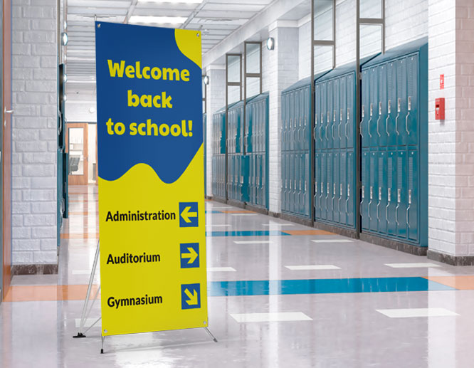 Freestanding back to school banner with arrows showcasing directions around the school