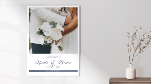 A gator board sign showcasing an image of a newlywed couple with their names and wedding date written underneath.