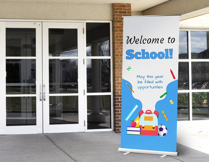 Colorful welcome back to school banner displaying a quote placed at the school front door