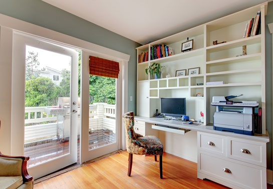 space saving white cabinets in the home office