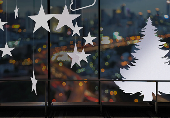 simple office Christmas decoration ideas with cut out stars and trees