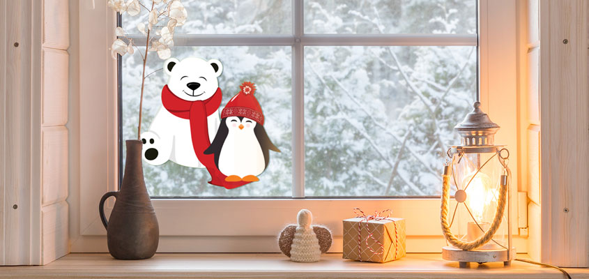 winter themed home window decorating idea with cute bear and penguin decals