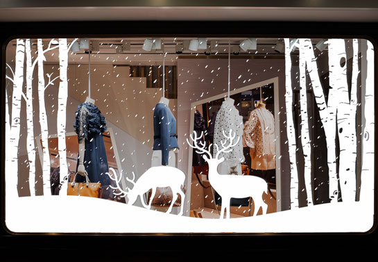 christmas window decoration idea with winter forest decals