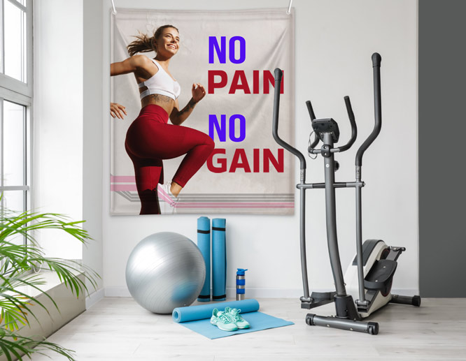 Workout inspirational wall art with the quote "No pain, no gain" in the office gym