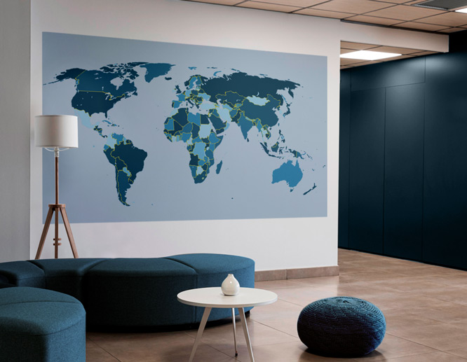 world map peel and stick wall art in blue on an office wall